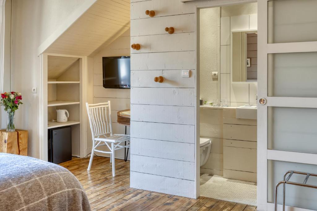 Postel nebo postele na pokoji v ubytování Chalet Hotel La Féline Blanche
