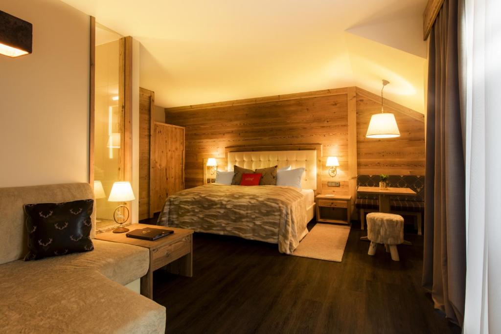 Postel nebo postele na pokoji v ubytování Wellnesshotel Oswald
