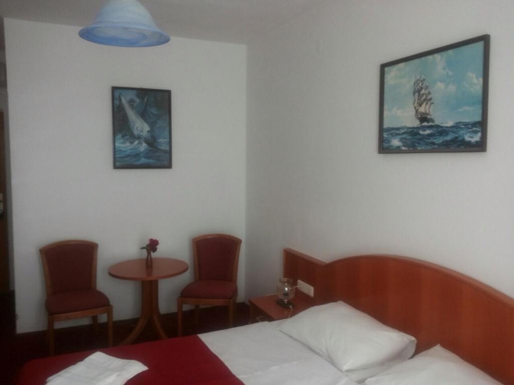 Postel nebo postele na pokoji v ubytování Villa Pincevic