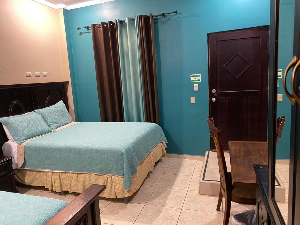 Postel nebo postele na pokoji v ubytování Refugio de la Montaña B&B