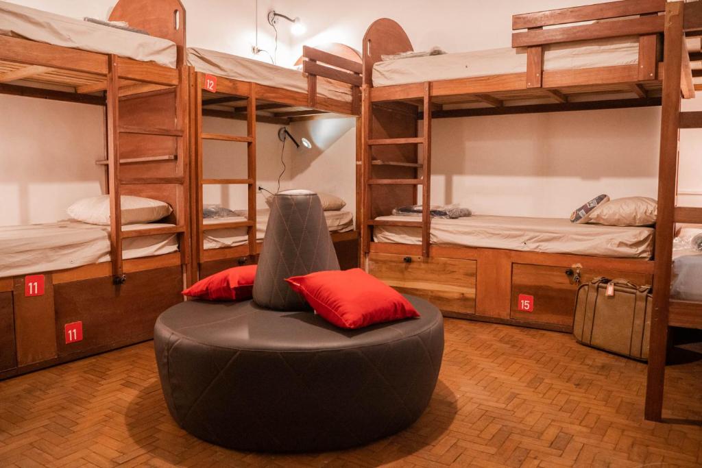 Postel nebo postele na pokoji v ubytování Garoa Hostel Party Bar