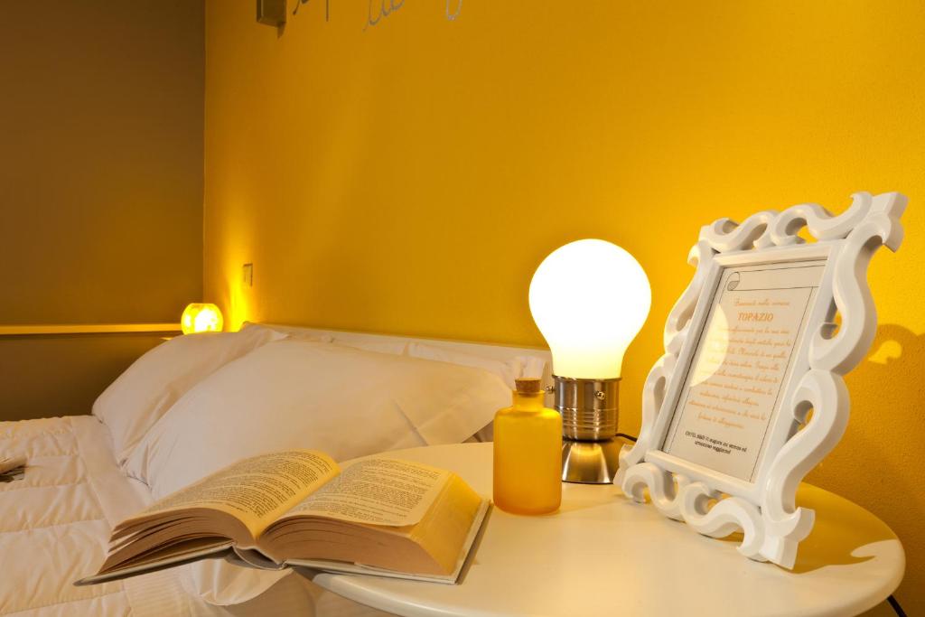 Łóżko lub łóżka w pokoju w obiekcie GIO'EL Happiness Guest House