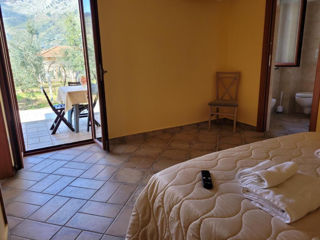 Posezení v ubytování ALLOGGIO TURISTICO MAGNIFICO ALESSANDRO VALLE BERNARDO 04025 LENOLA LT CIR 19063 nei pressi di 04022 FONDI LT
