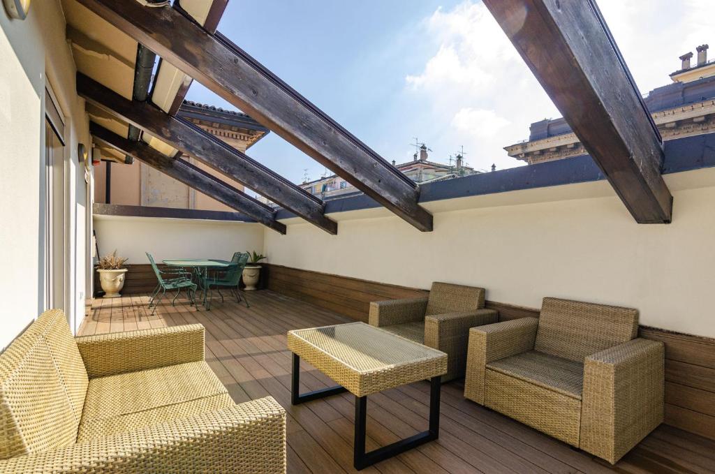 A seating area at Rizzoli Terrace Apartment