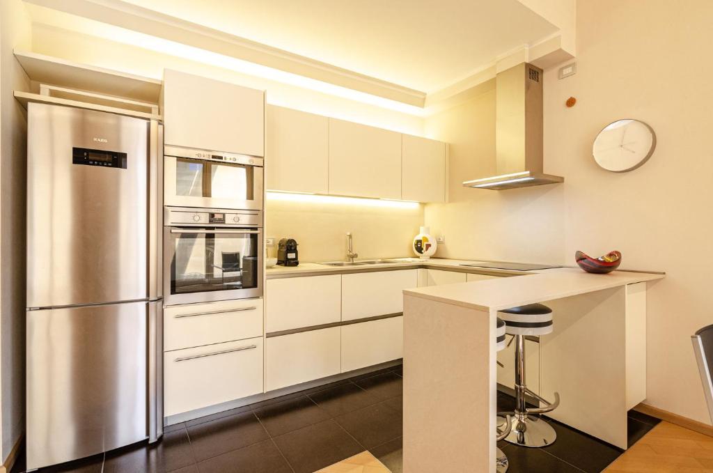 A kitchen or kitchenette at Rizzoli Terrace Apartment