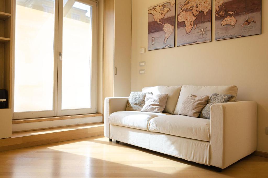 A seating area at Rizzoli Terrace Apartment