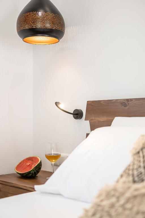 Postel nebo postele na pokoji v ubytování Galazia Boutique Apartments
