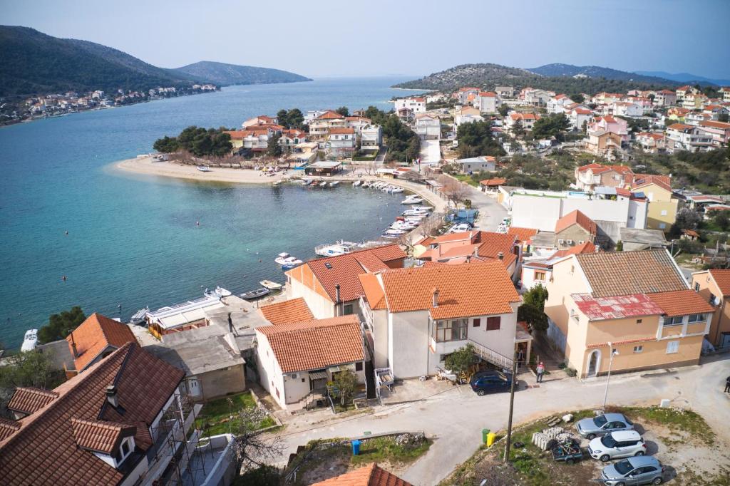 an aerial view of a town and a beach at Apartments by the sea Grebastica, Sibenik - 482 in Grebaštica