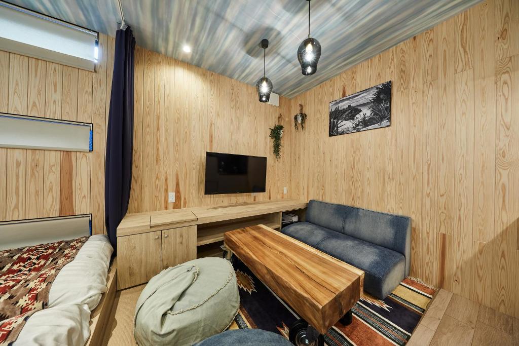 TV a/nebo společenská místnost v ubytování Hotel TORACO konohana