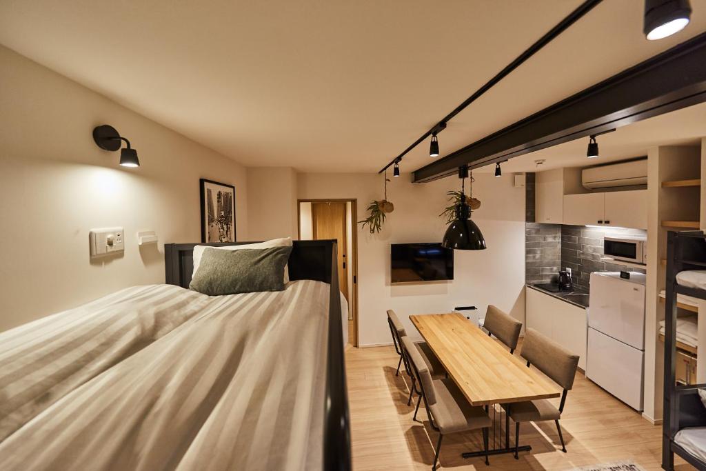 TV a/nebo společenská místnost v ubytování Hotel TORACO konohana