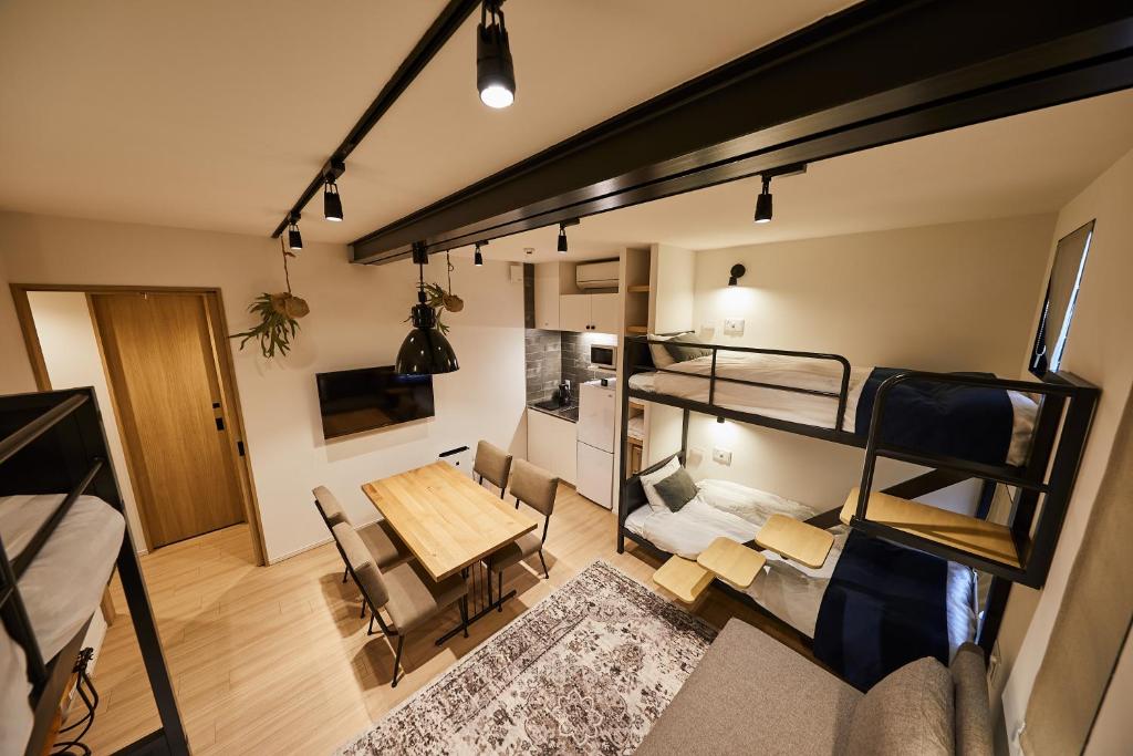 TV a/nebo společenská místnost v ubytování Hotel TORACO konohana