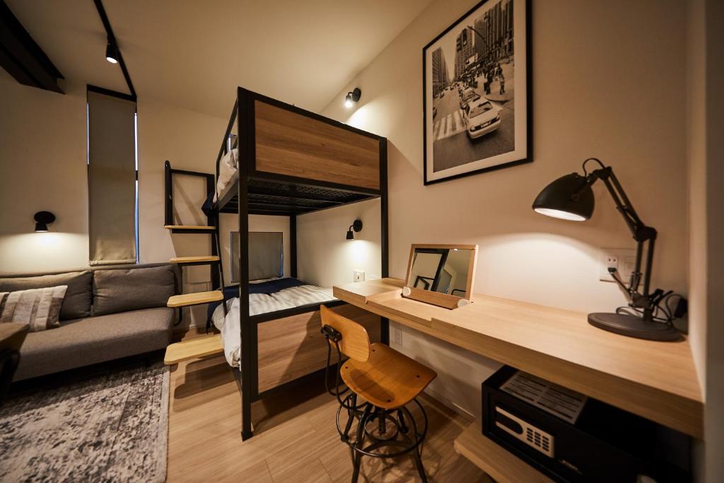 Postel nebo postele na pokoji v ubytování Hotel TORACO konohana
