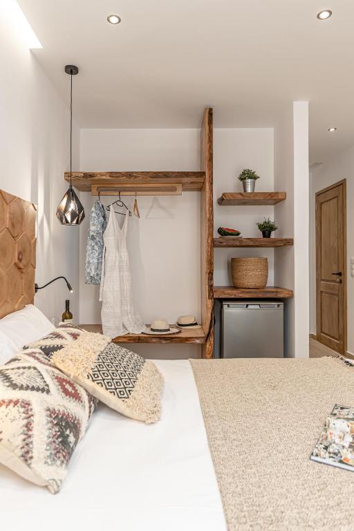 Postel nebo postele na pokoji v ubytování Galazia Boutique Apartments