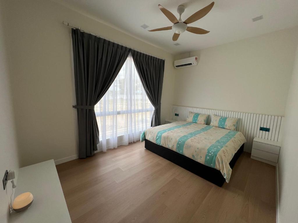 Postel nebo postele na pokoji v ubytování TANJUNG GROVE VILLAS