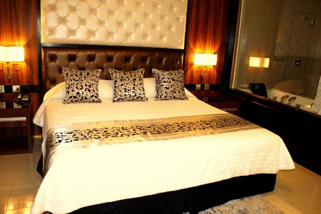Postel nebo postele na pokoji v ubytování Central Park Tower Resort
