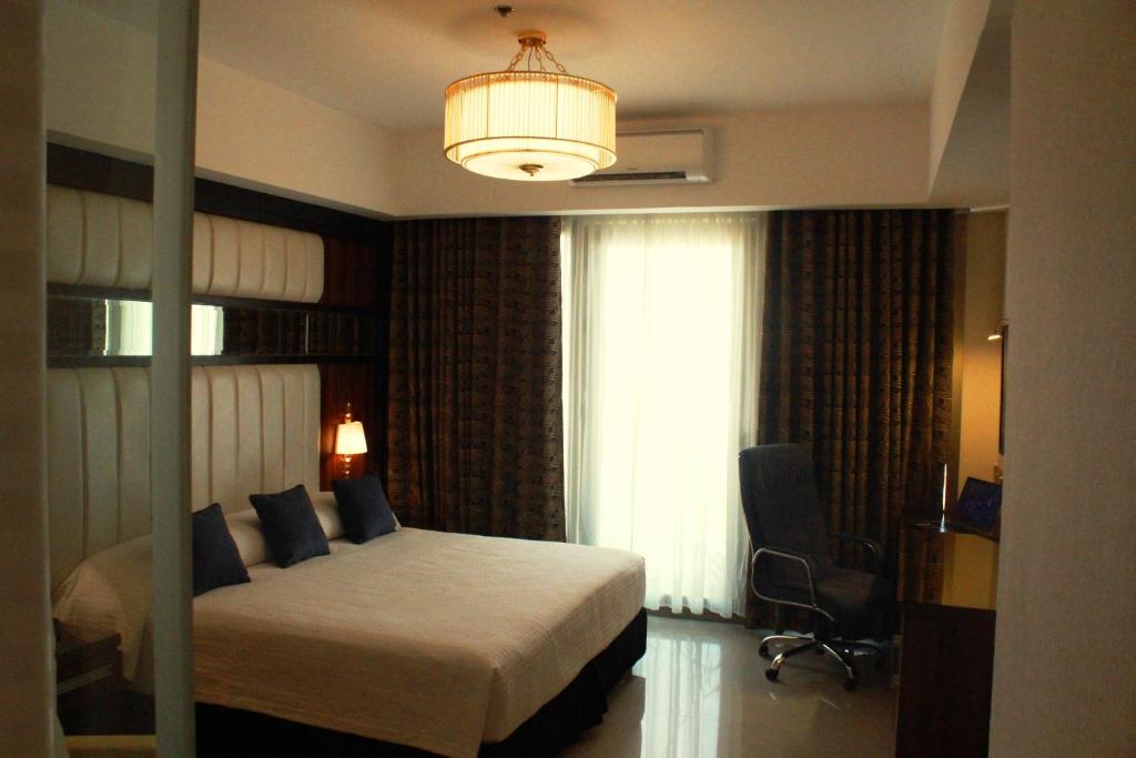 Postel nebo postele na pokoji v ubytování Central Park Tower Resort