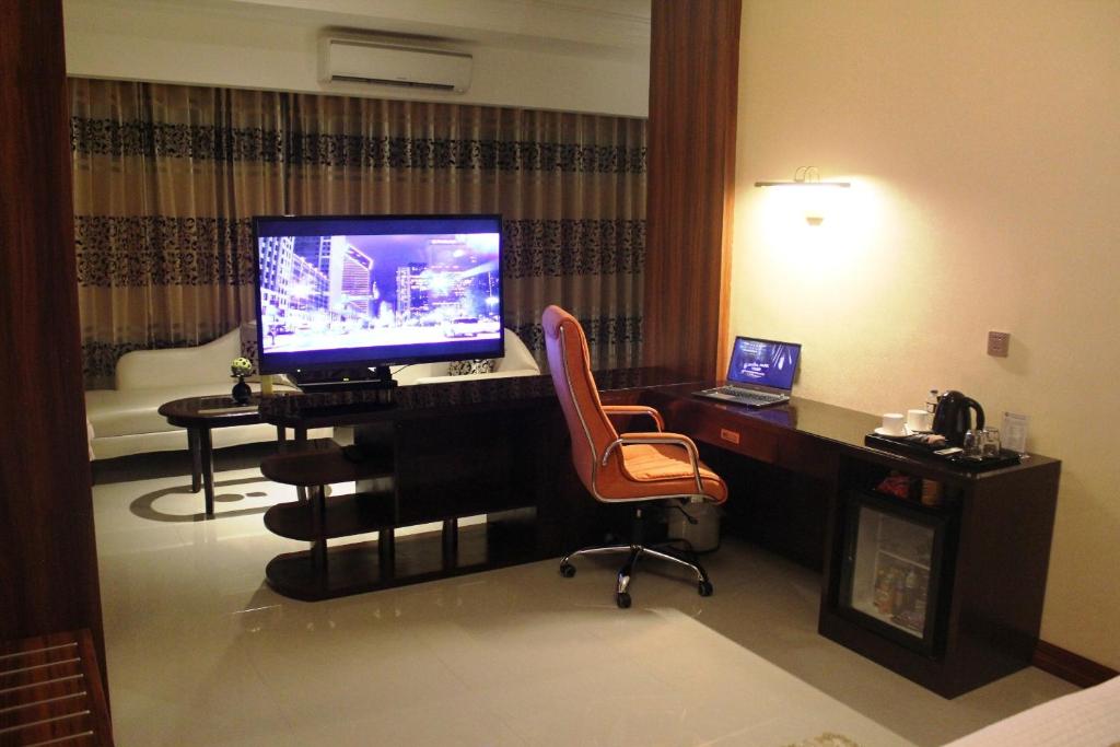 TV a/nebo společenská místnost v ubytování Central Park Tower Resort