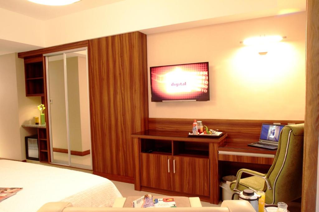 TV a/nebo společenská místnost v ubytování Central Park Tower Resort