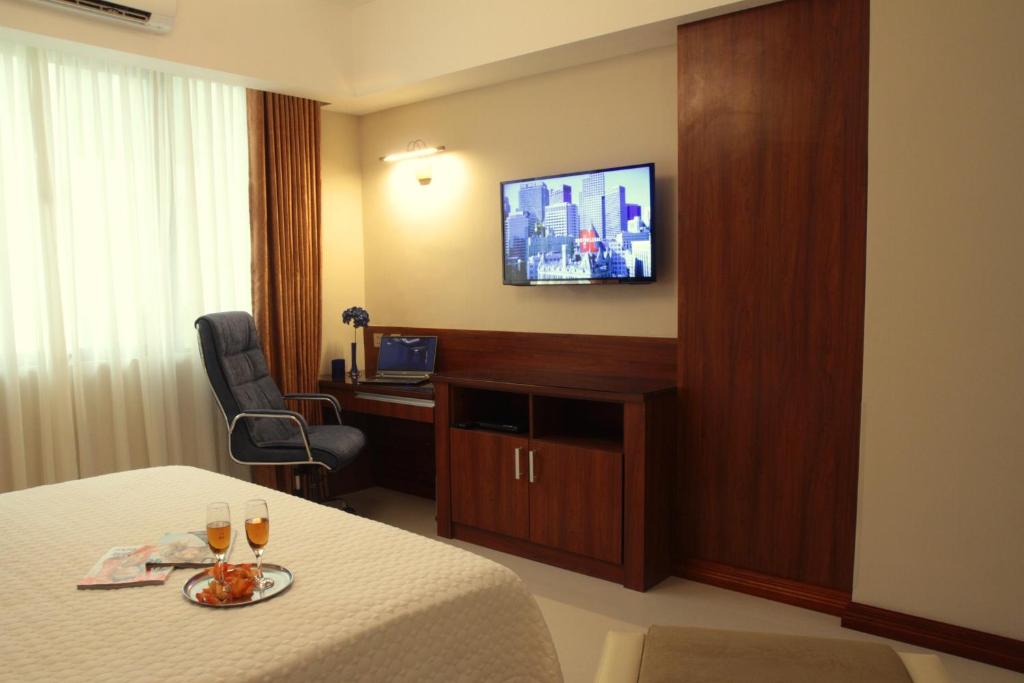 TV a/nebo společenská místnost v ubytování Central Park Tower Resort