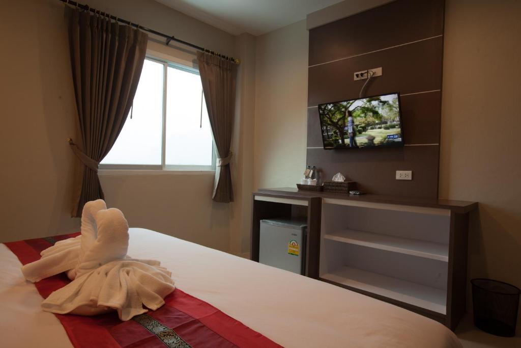 Postel nebo postele na pokoji v ubytování Pranee Home Phang-nga