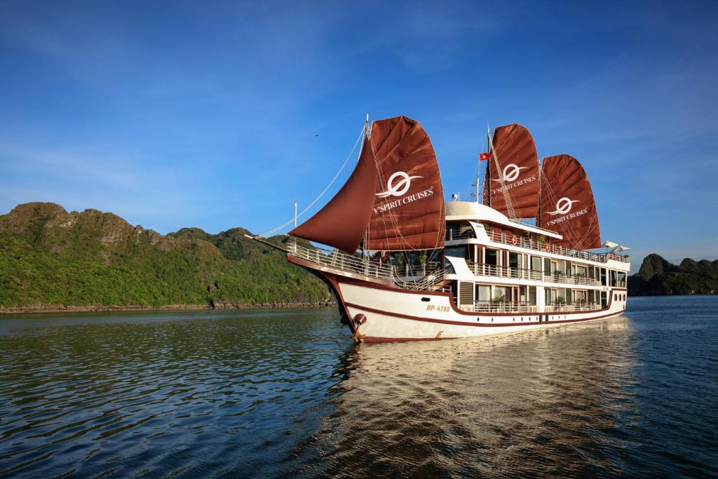 a cruise ship in the water on a lake at V'Spirit Cruises in Ha Long