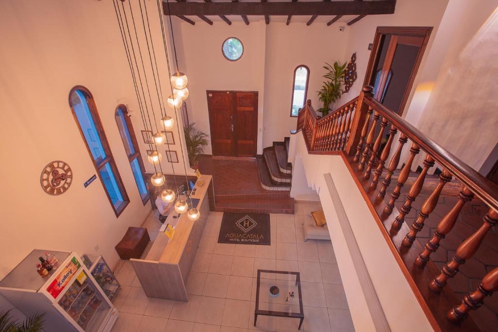 an overhead view of a staircase in a house at Aguacatala Hotel Boutique in Medellín
