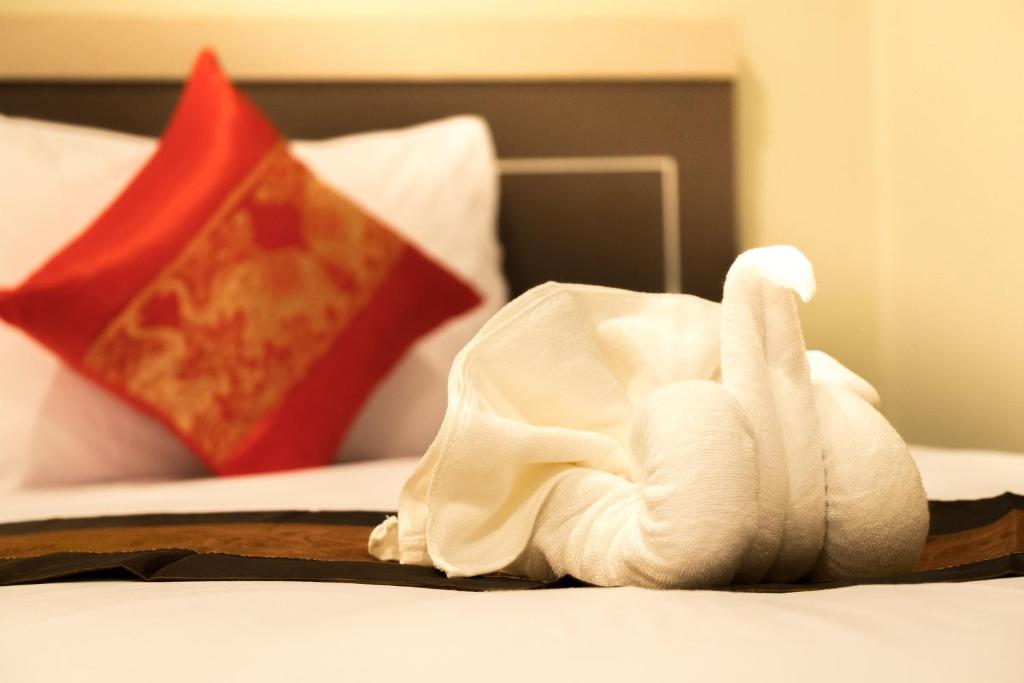 Postel nebo postele na pokoji v ubytování Pranee Home Phang-nga