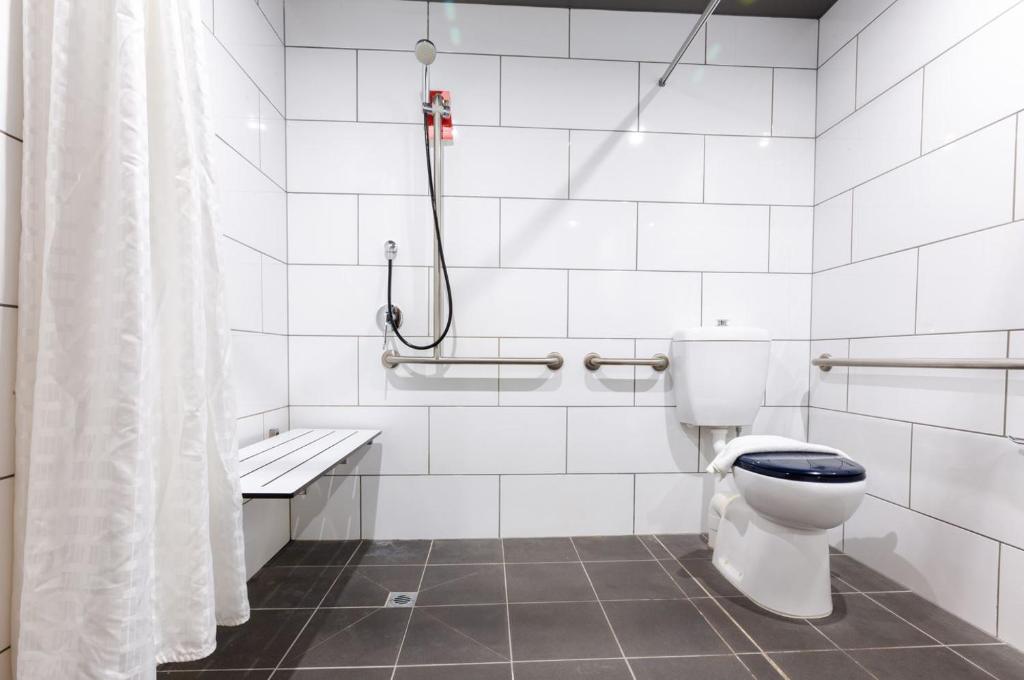 Koupelna v ubytování Essence Hotel Carlton