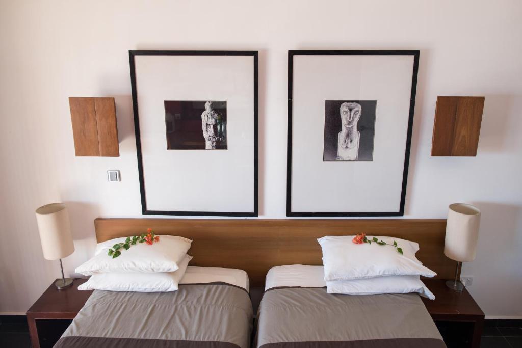 Postel nebo postele na pokoji v ubytování Hotel Esplanada