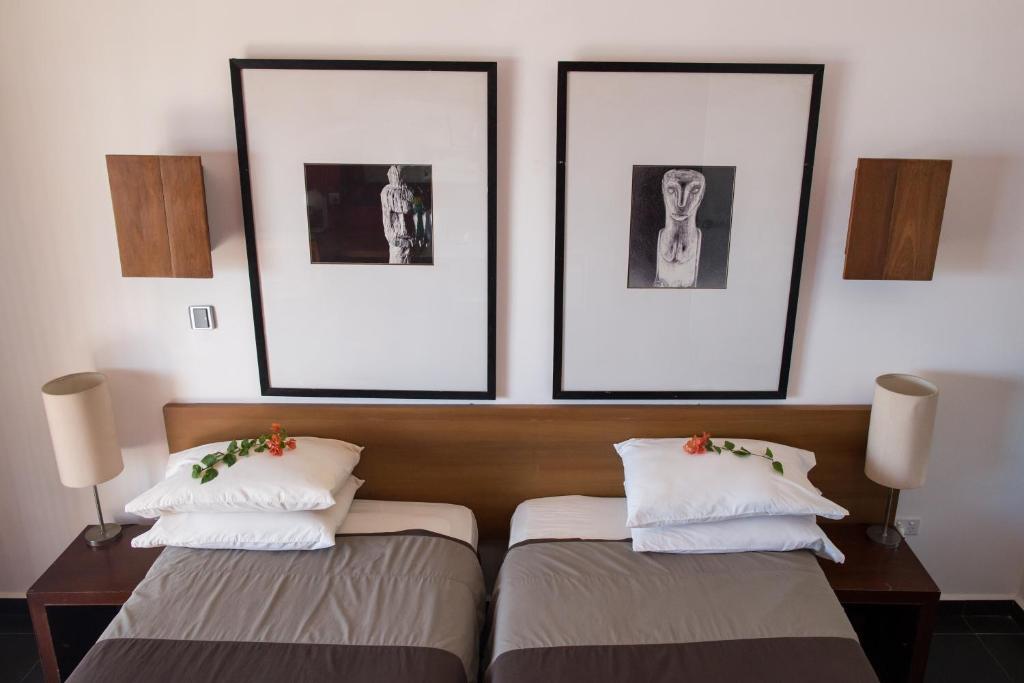 Postel nebo postele na pokoji v ubytování Hotel Esplanada