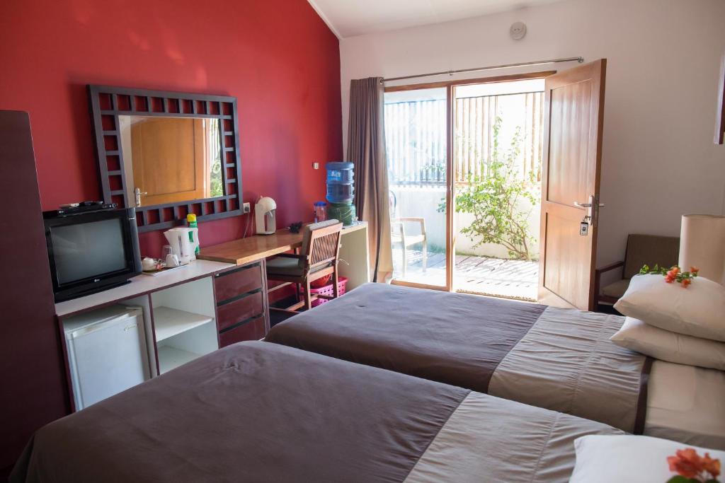 Postel nebo postele na pokoji v ubytování Hotel Esplanada