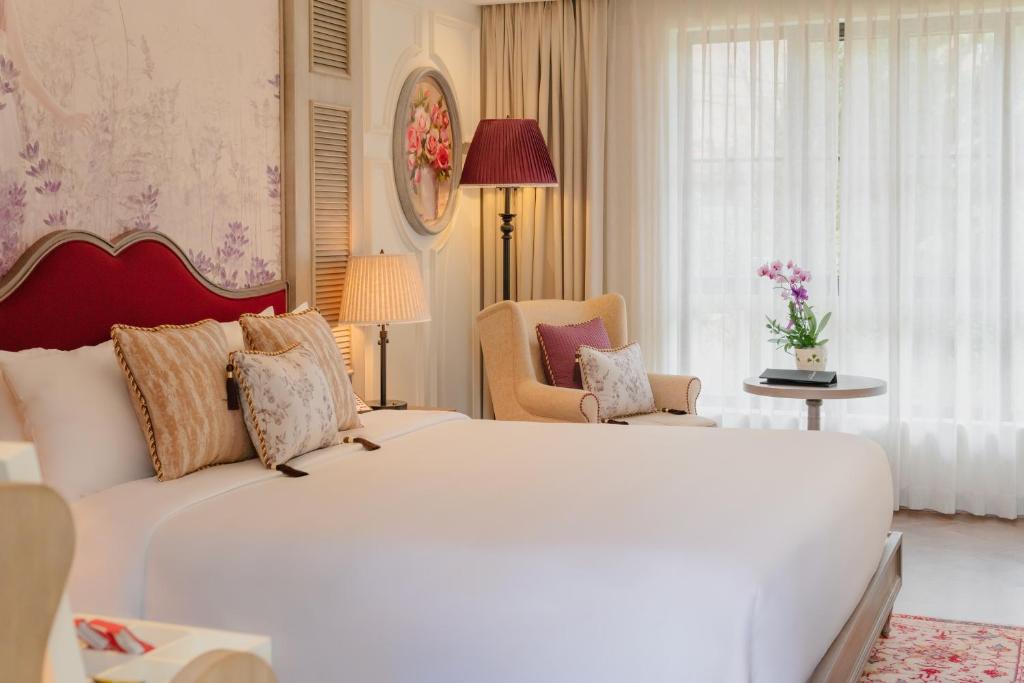 Postel nebo postele na pokoji v ubytování Mercure Dalat Resort