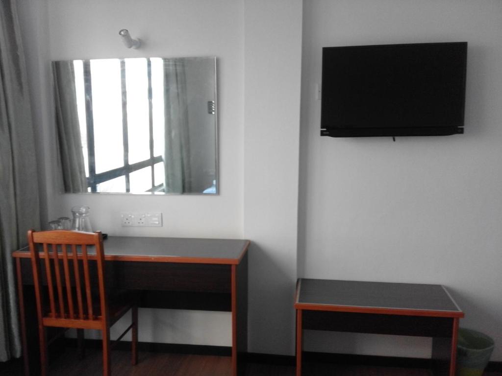 TV a/nebo společenská místnost v ubytování 101 Hotel