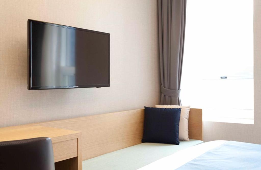 TV a/nebo společenská místnost v ubytování Days Hotel by Wyndham Seoul Myeongdong