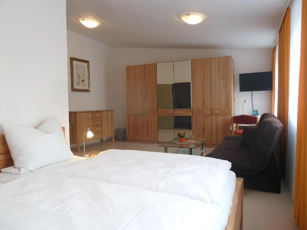 Postel nebo postele na pokoji v ubytování Garni Hotel Leitl GmbH