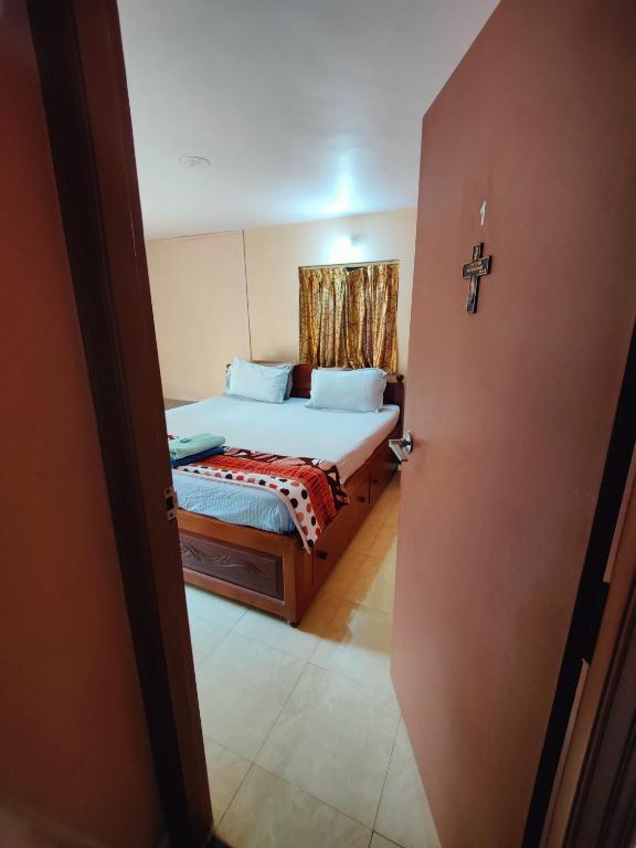 Postel nebo postele na pokoji v ubytování Menezes House
