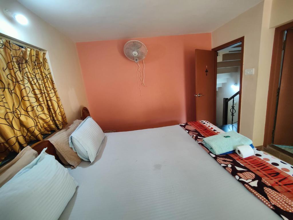 Postel nebo postele na pokoji v ubytování Menezes House