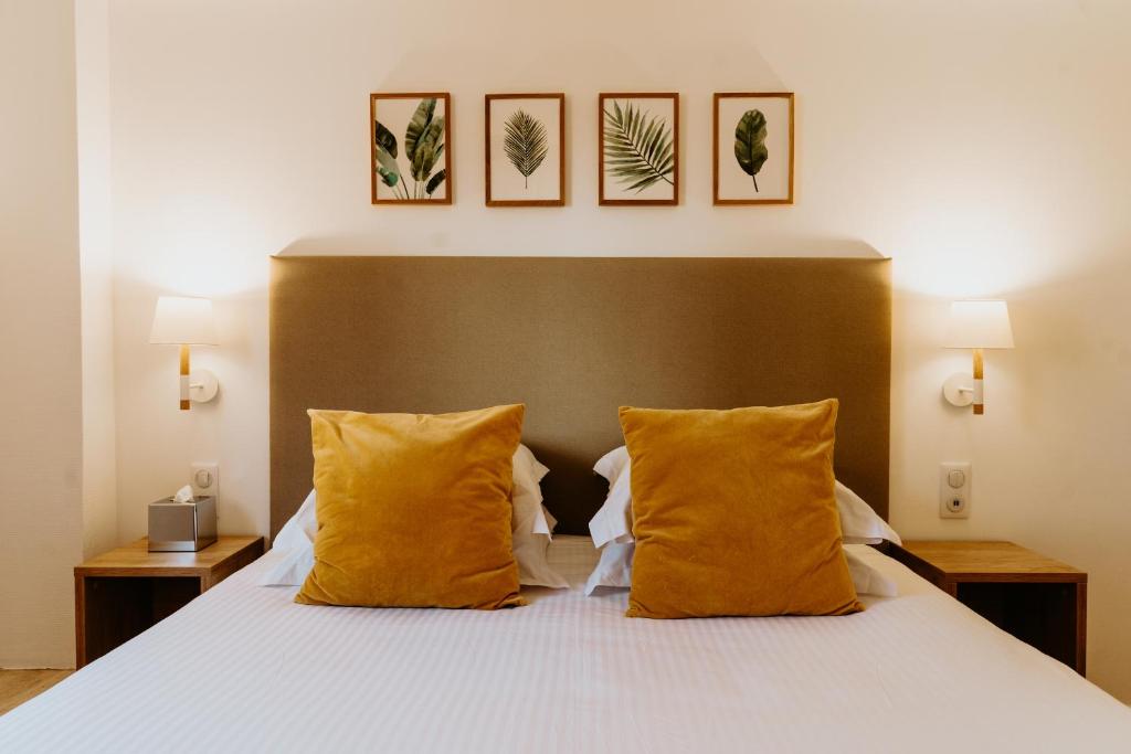 Postel nebo postele na pokoji v ubytování Palm Boutique Hôtel Nice