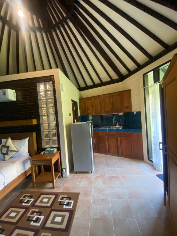 Kuchyň nebo kuchyňský kout v ubytování Jepara Marina Beach Bungalows
