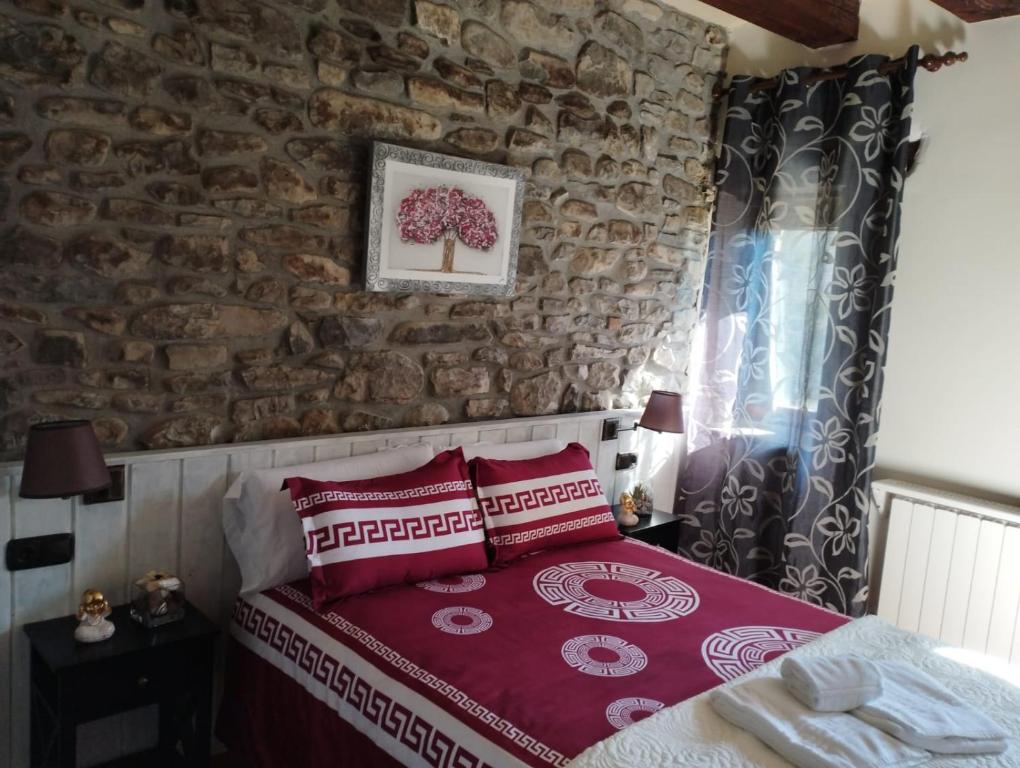 Postel nebo postele na pokoji v ubytování Cimas con historia