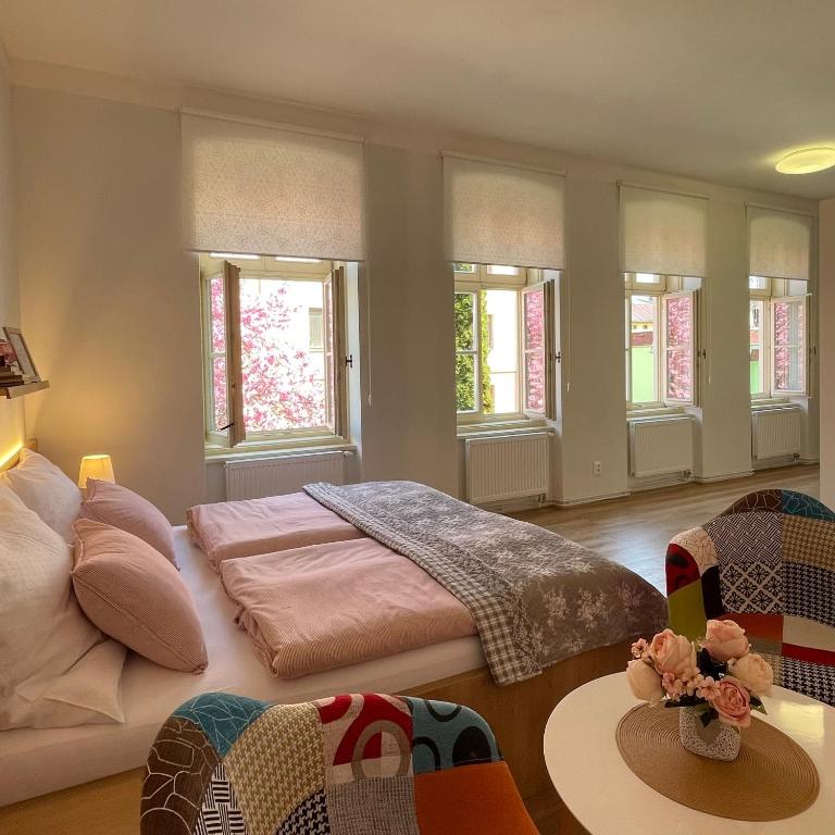 Postel nebo postele na pokoji v ubytování Apartmány Bašta & Wellness