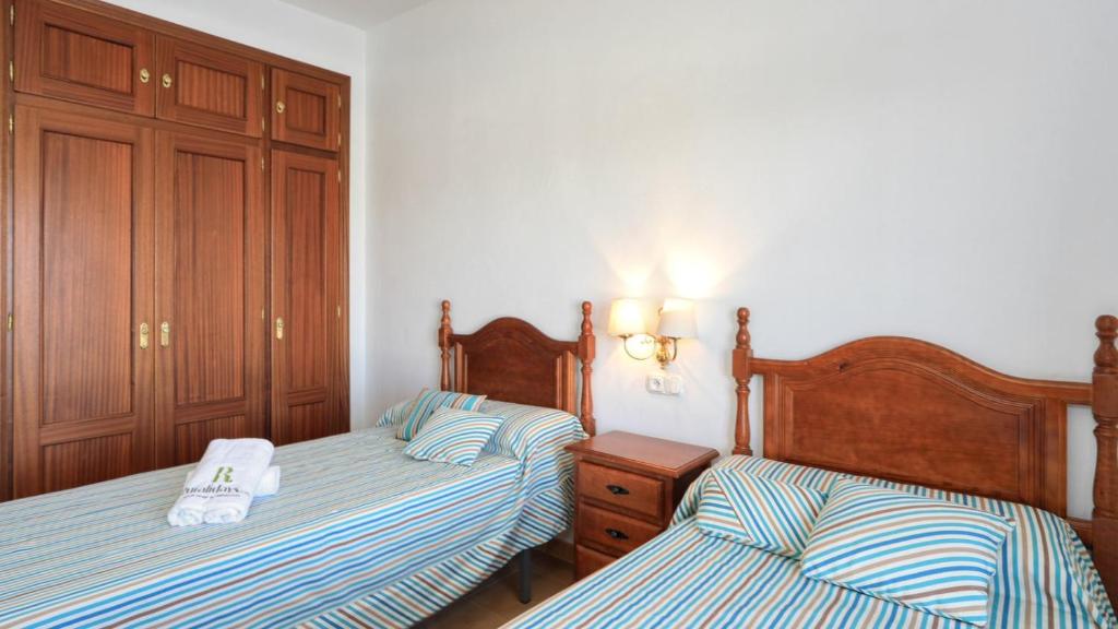 Łóżko lub łóżka w pokoju w obiekcie Casa La Gallega Alhaurin de la Torre by Ruralidays
