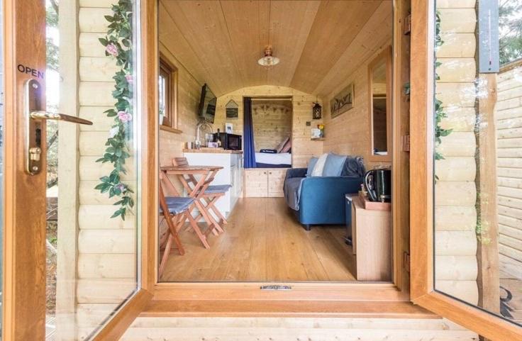 an open door of a tiny house with a kitchen at The hideaway in Bristol
