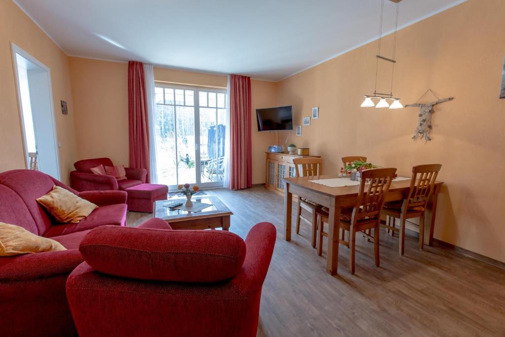 Μια τηλεόραση ή/και κέντρο ψυχαγωγίας στο Villa-Senta-Apartment-1