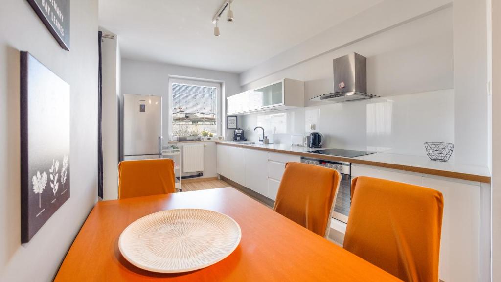 Kuchyňa alebo kuchynka v ubytovaní Apartamenty Sun & Snow Legionów