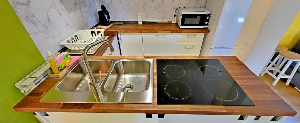 A cozinha ou kitchenette de Simonai Apartment
