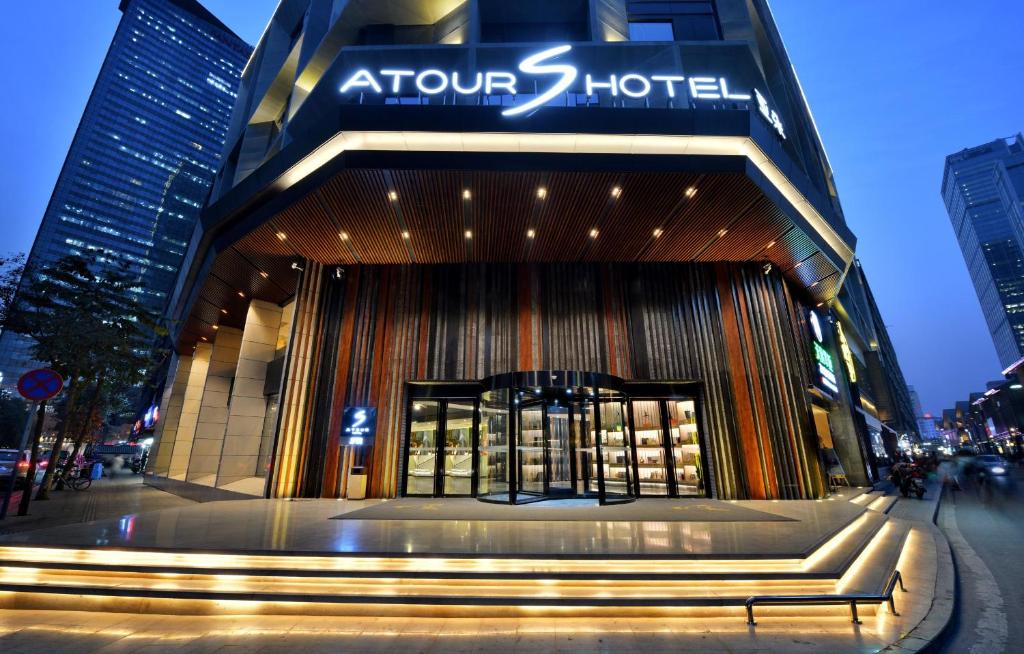 a store front of a building with a sign on it at Atour S Hotel Chengdu Taikoo Li in Chengdu