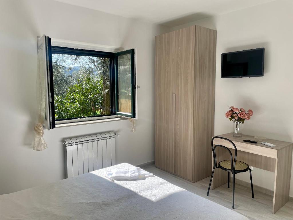 Postel nebo postele na pokoji v ubytování Sorrento Realty Holidays - The smile of the sun
