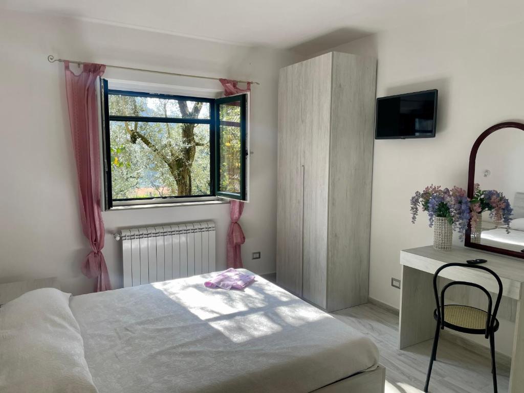Postel nebo postele na pokoji v ubytování Sorrento Realty Holidays - The smile of the sun