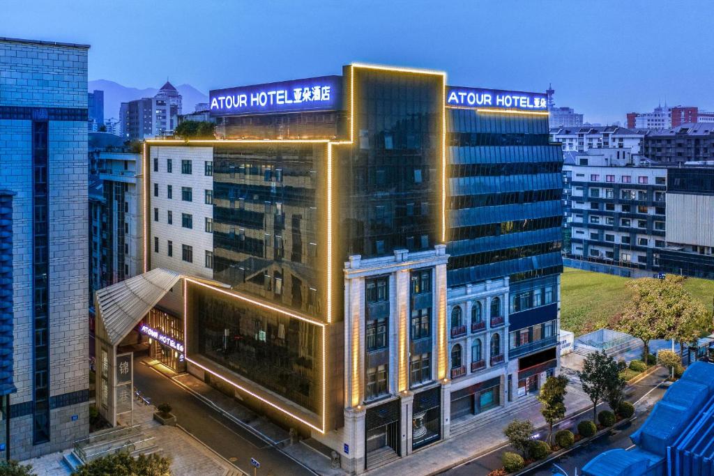 an image of an office building in a city at Atour Hotel Three Lanes and Seven Alleys Fuzhou in Fuzhou